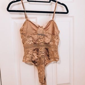 Nude lace bodysuit